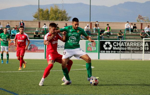 Álex y Écija en el partido de la primera vuelta. / M. CAMACHO